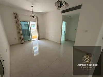 1BR hall, second-tenant unit in Al Hamidiya 1 with open-view balcony, panoramic bedroom view, spacious kitchen, 2 bathrooms. Rent 33,000 AED yearly