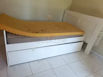 White single bed frame with trundle and headboard - used