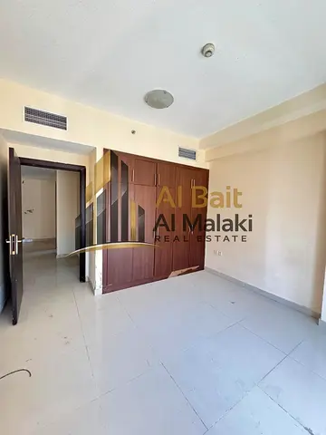 2 bedrooms, living room, 2 bathrooms, central air conditioning, free parking, built-in wardrobes.