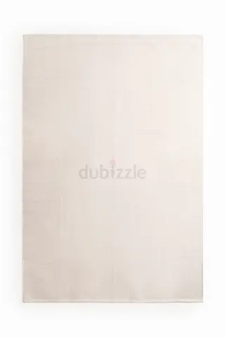 Textured cotton rug from HM home