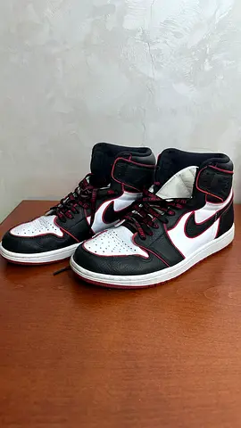 Used Nike Air Jordan-style high-top sneakers, size unknown, good condition