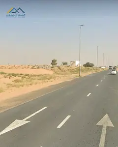 ### For sale: A plot of land in a commercial area on the main road - **Opposite Al Azha 2 Complex**