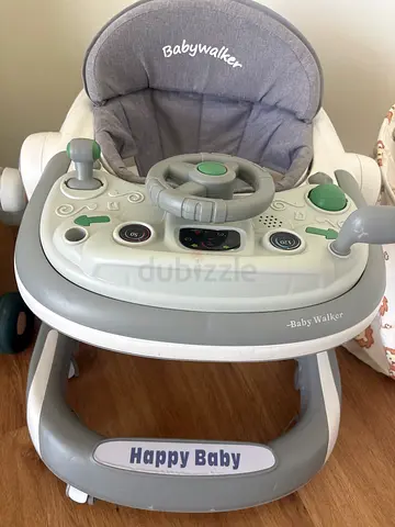 Lightly used grey Babywalker baby walker with activity tray - Good condition