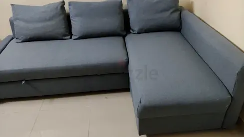 L-shaped grey fabric sofa with chaise - good condition