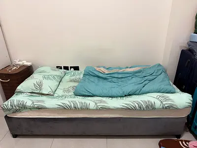 Single upholstered bed base with mattress and bedding - good condition