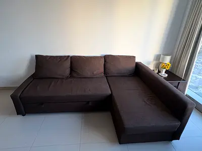 L-Shape Sofa Bed in excellent condition (cushions included)