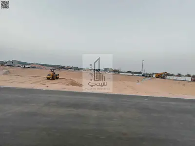 Land for sale including registration fees, paved roads