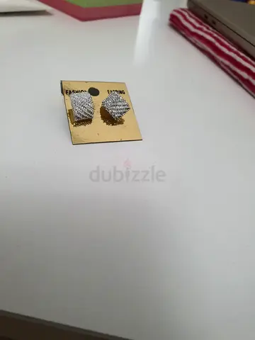 Pair of rectangular curve crystal stud earrings - silver tone