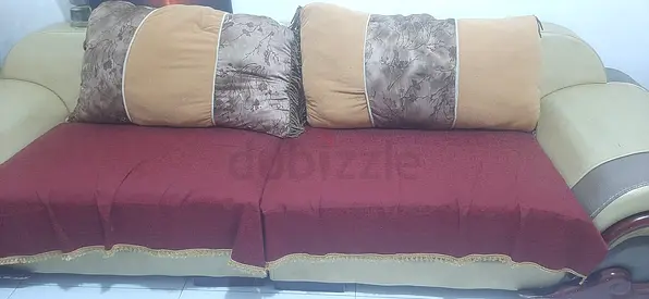 3-seater beige leather sofa with cushions - good used condition