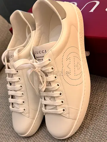 Authentic. Gucci Ace sneakers in white leather with a perforated Interlocking G logo