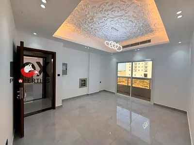 Two bedrooms and a living room for annual rent in Ajman, Al Alia area. New building, first occupancy. 3 bathrooms. Balcony. Price: AED 45,000.