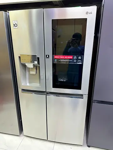 LG brand instaview side by side frige and freezer , neat and clean latest model knock door perfect