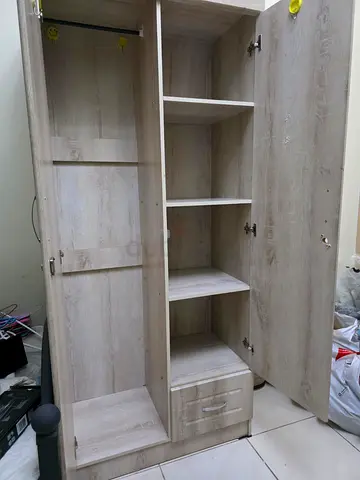 Light Wood Wardrobe with Shelves and Drawer