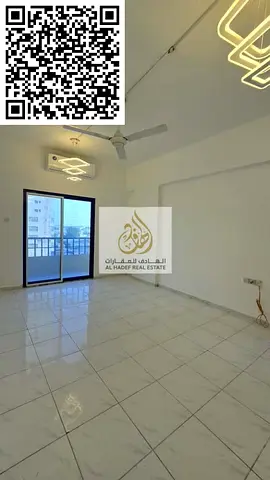 A separate room and living room, a large hallway with a balcony, and two bathrooms in Al Nuaimiya 1, near Emirates Markets.