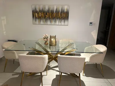 Glass Top Dining Table with 6 White Upholstered Chairs (Gold Base)