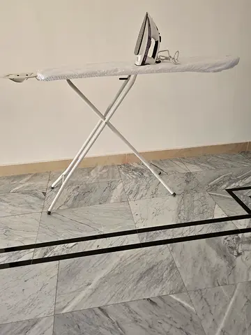 Ironing table and steam iron