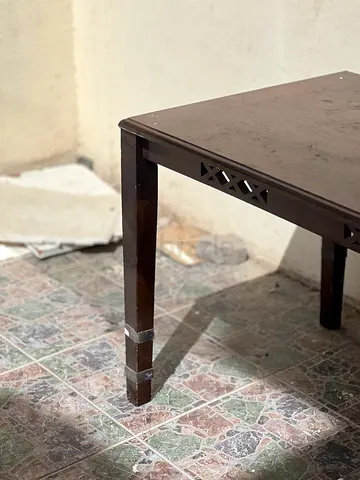 Classic Dark Brown Wooden Coffee Table with Decorative Cutouts