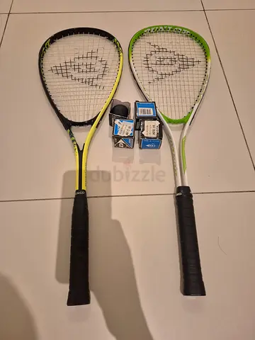 Two Dunlop Squash Rackets with New 4 Ball - Good Condition