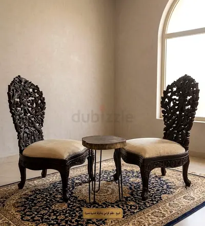 Pair of Hand-Carved Wooden Accent Chairs with Small Side Table
