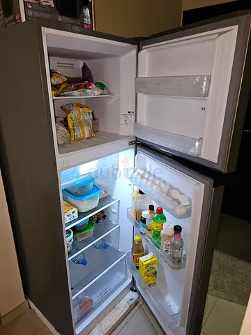 Used Hisense 320L double-door refrigerator with top freezer - excellent working condition