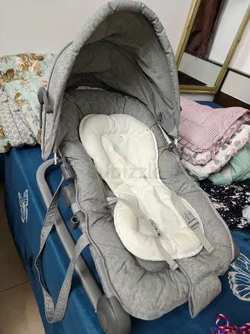Gray baby rocker/bouncer with canopy - used, good condition
