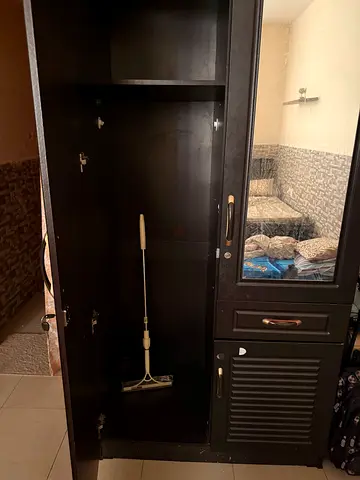 Wardrobe in dark brown color
