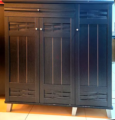 Dark Wood 3-Door Shoe Cabinet with a drawer.