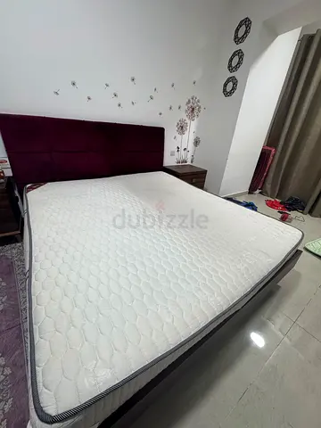 King bed with mattress and dressing table and a drawer