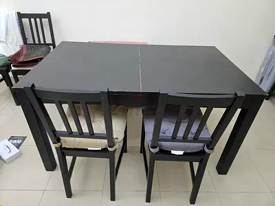 Solid Black Wooden Dining Table with 4 Chairs - Good Condition