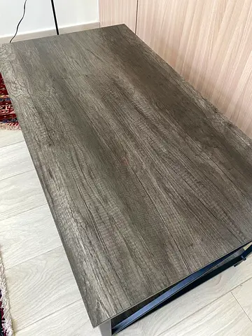 Used rectangular coffee table with rustic grey wood finish