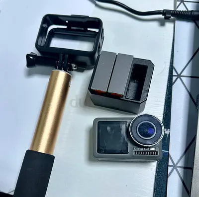 DJI Osmo Action Camera with Battery Hub and 3 batteries