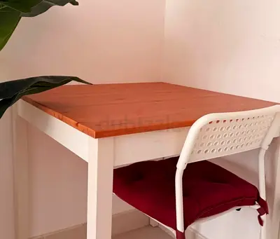Simple wooden dining/ study table with white legs - good condition