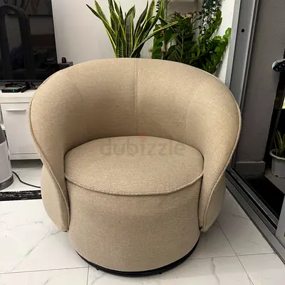 Cream swivel chair
