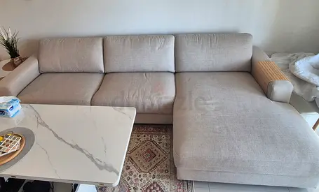 Light beige L-shaped fabric sofa with chaise - great condition, 294 cm in width