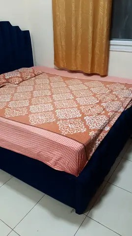 Queen-sized upholstered bed frame with mattress 2 big blue velvet urgent sale