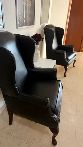 Black leather armchairs - pair for sale