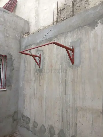 Wall-mounted pull-up / chin-up bar (sturdy metal frame) -