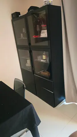 IKEA black glass-door cabinet with drawers — good condition