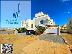 Villa for sale in Ajman, Al Yasmin area. The villa consists of 5 master bedrooms, a majlis, 2 livin