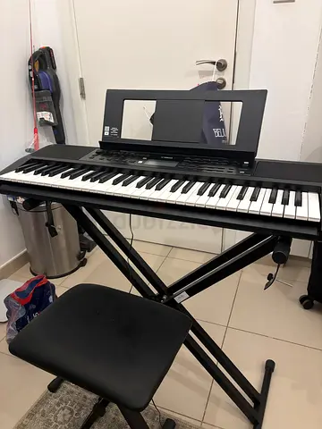 Yamaha Digital Piano - Home (PSRE373) used once! With original box , chair and stand included