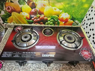 Geepas 3 Burner Gas Cooker Stainless Steel Frame  Tray, Tempered Glass Top, Iron Burners