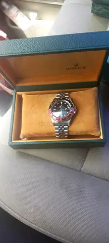 Rolex GMT-Master Coke stainless steel watch with jubilee bracele..almost new condition.