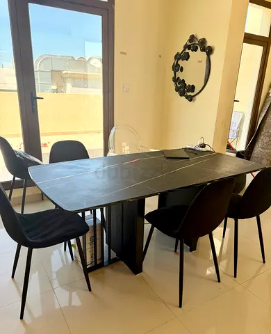 Modern black dining table with 6 chairs - good condition