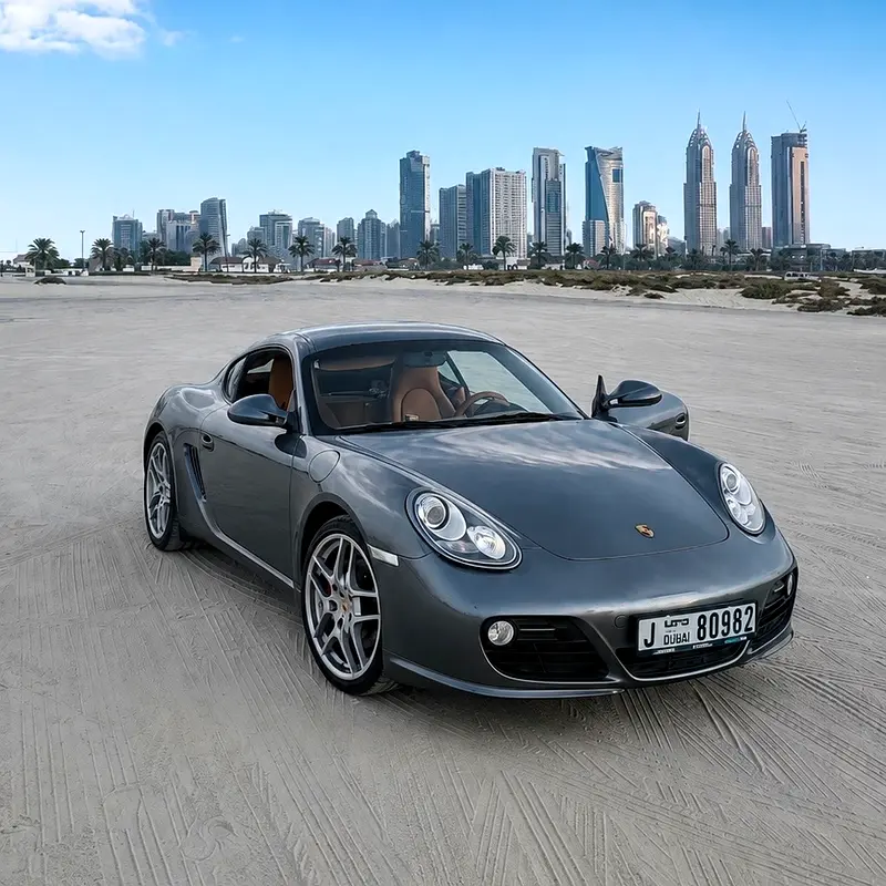 Porsche Cayman 2011 — photo 1 of 6