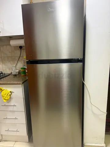 Used stainless steel double-door refrigerator - good condition