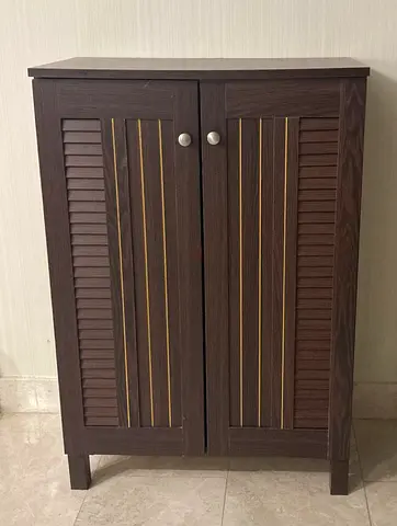 Compact dark wood storage cabinet with shelves - very good condition