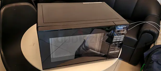 Microwave Panasonic like new one month used only 51 programs