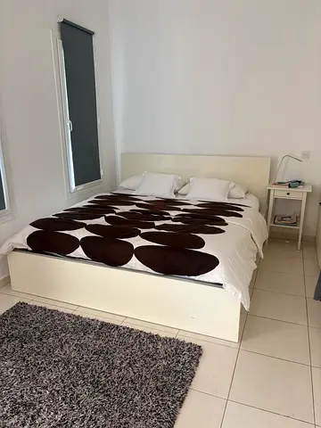 Queen bed frame with mattress and bedside table - good condition