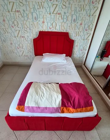 Single Bed with Red Upholstered Headboard and Base with Mattress
