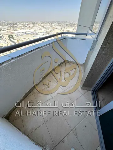 2BR Apartment + Maid Room in Al Taawun — Balcony & Free Parking